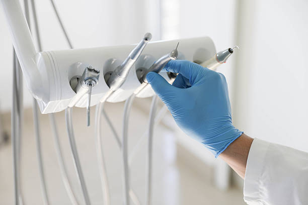 Professional Tooth Extraction technician working in Bellevue, IA